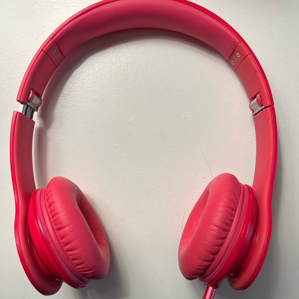 Hot pink beats headphones